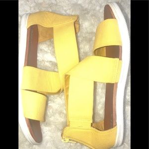 these are yellow sandals by the brand MIA
